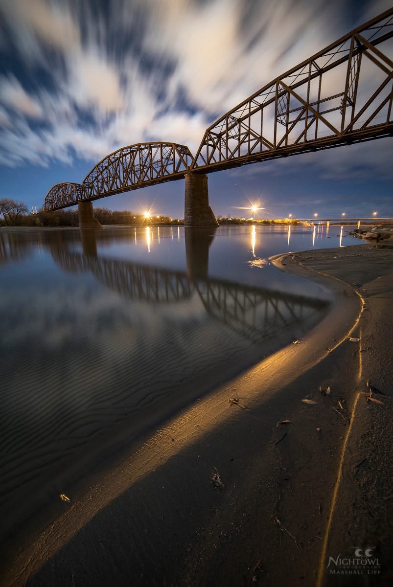 Blue hour along the curved shoreline