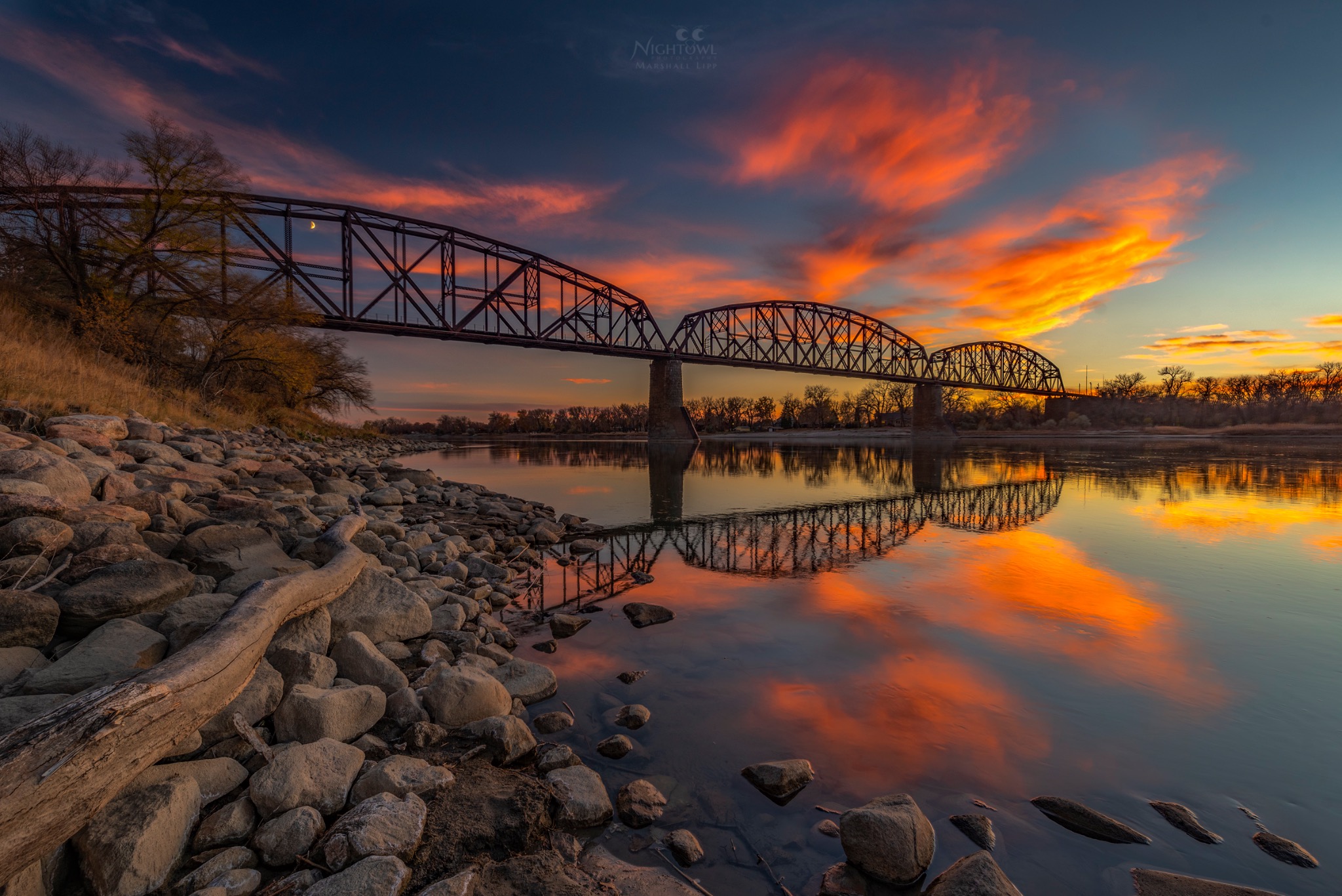 Train bridge in dramatic evening light