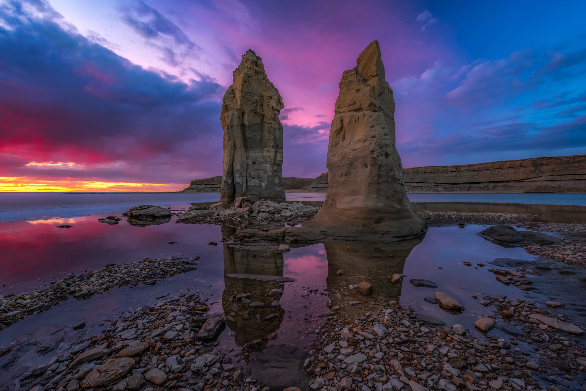 Sea stacks beneath a vivid sky