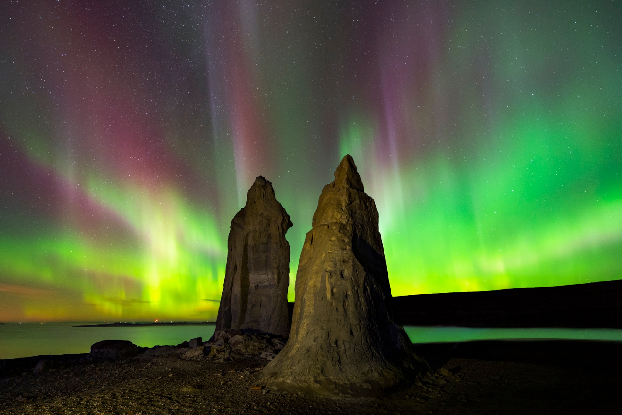 Aurora above the sea stacks